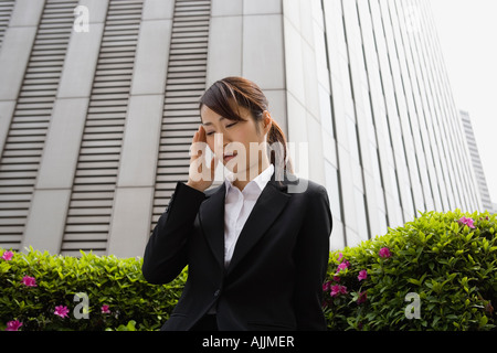 Young woman having headache Stock Photo