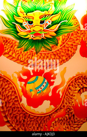 An imperial dragon with the sacred pearl of wisdom: a Chinese mythological creature Stock Photo