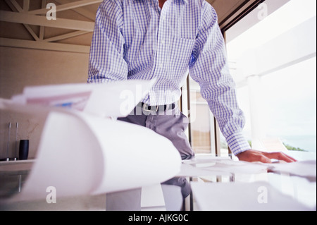 Man with paperwork Stock Photo