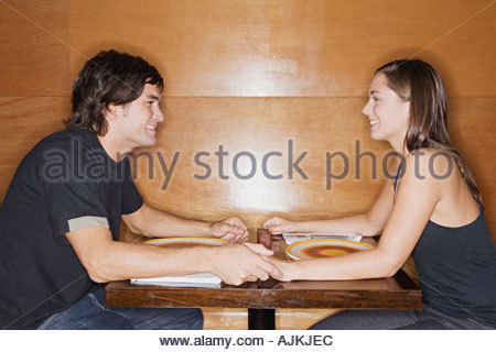 https://l450v.alamy.com/450v/ajkjec/young-couple-in-a-restaurant-ajkjec.jpg