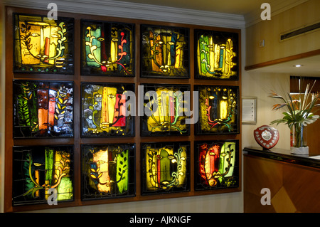 The Wessex Hotel John Piper stained glass created in 1964 based on the Green Man Winchester Hampshire Stock Photo