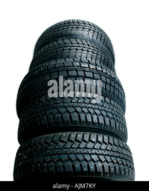 Brand new tires stacked up and isolated on white background worms view Stock Photo