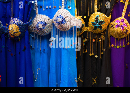 Colourful Dresses on sale in the Alcaiceria Granada Spain Stock Photo