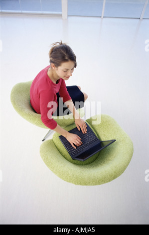 Office worker using laptop Stock Photo
