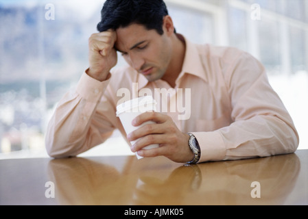Stressed office worker Stock Photo