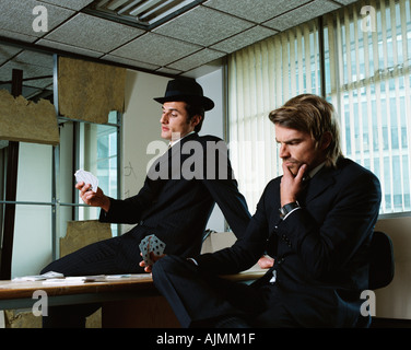 Gangsters playing cards Stock Photo