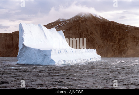 giant iceberg floating off the coast of Antarctica Stock Photo