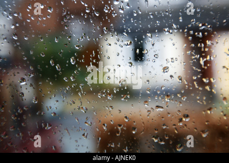 Raindrops on windowpane Stock Photo