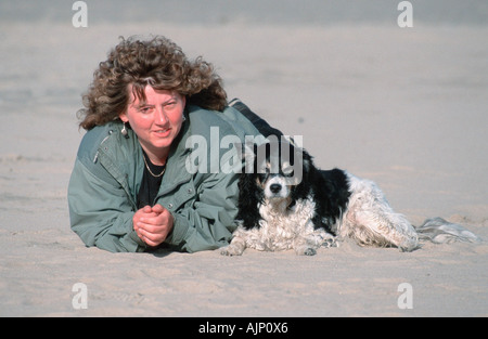 Woman and Mixed Breed Dog Stock Photo
