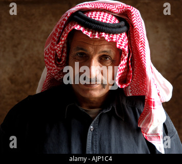 Portrait of guard with red and white kaffiyeh Citadel Amman Jordan Stock Photo