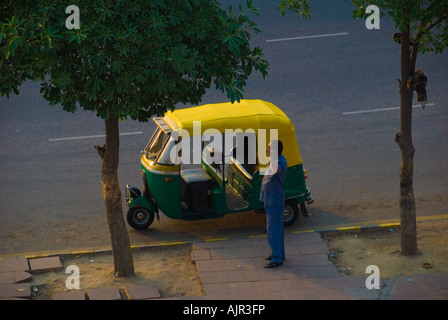 An Auto Rickshaw Tuktuk Three Wheeled Taxi using Compressed Natural Gas New Delhi India Stock Photo