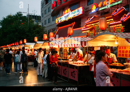 Food stalls at Donganmen night food market near Wangfuging Dajie Beijing China Stock Photo