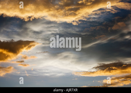 Sunset storm clouds in India. Indian cloudy sky in the evening sunlight Stock Photo