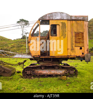 abandoned digger  in field Stock Photo