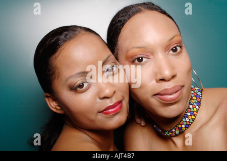 two black women hugging each other Stock Photo