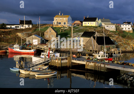 CANADA Nova Scotia dark storm clouds hovering over the fishing village of Peggys Cove near Halifax Stock Photo