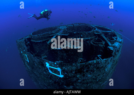 scuba diver over the funnel Amoco Milford Haven oil tanker wreck Liguria Mediterranean Sea Italy Stock Photo