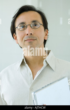 Man looking up, smiling, portrait Stock Photo