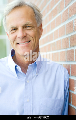 Mature man smiling at camera, portrait Stock Photo