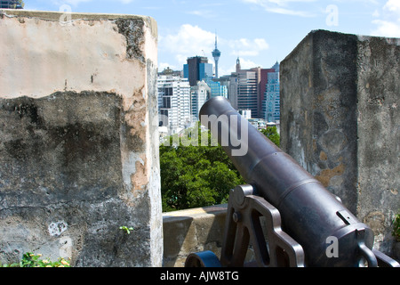 Iron Cannon Fortaleza do Monte Colonial Fort in Macau SAR Macau Tower in background Stock Photo