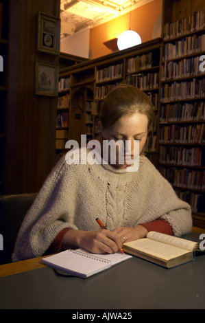 Female student studying in King s College Library Cambridge England 2004 Stock Photo