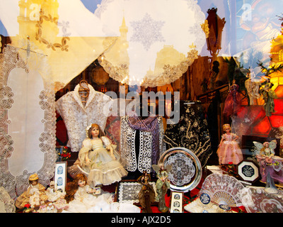 Shop window in Brussels with typical traditional lace products souvenirs Brussels Belgium Stock Photo