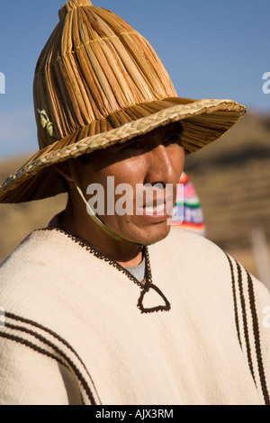 Uros  IruitosIndian man living on Phuwa island a floating reed island on Lake Titicaca, Bolivia