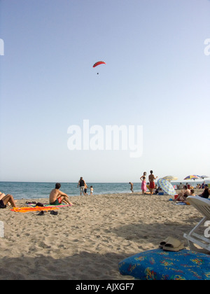 Powered Paraglider, Parapente, flies over Carvajal beach,  Costa del Sol, Spain, Stock Photo