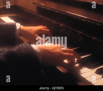 Lifestyle., Piano player. Close up of man's hands, Stock Photo