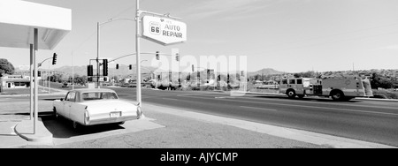 Car parked on Route 66 in Kingman Arizona Stock Photo