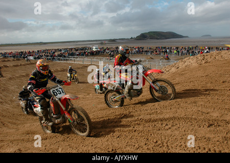 sand-encrusted riders at the Weston Beach Race,Somerset, England. UK Stock Photo