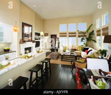 Wide angle shot showing a kitchen, dining room and living room Stock Photo