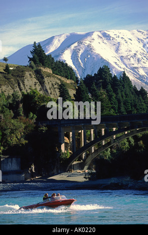 Jetboaters enjoying the conditions on the Rakaia River near Christchurch New Zealand Stock Photo