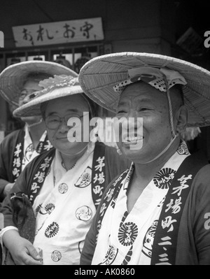 Participants of Sanno Matsuri Festival in historic clothing parading around city centre streets Tokyo Japan Eastern Asia Stock Photo