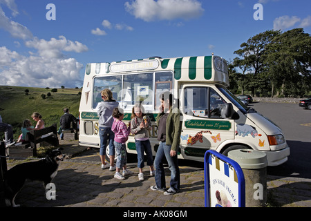 Ice Cream Van with people eating ice creams at Monsal Head Derbyshire Stock Photo