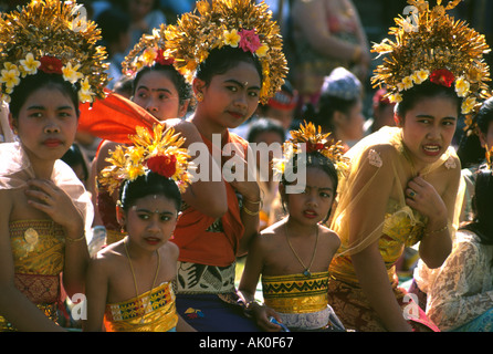 Group of balanese women and young girls in traditional costumes during the tradition mekare-kare that is fight the screw pine. Stock Photo