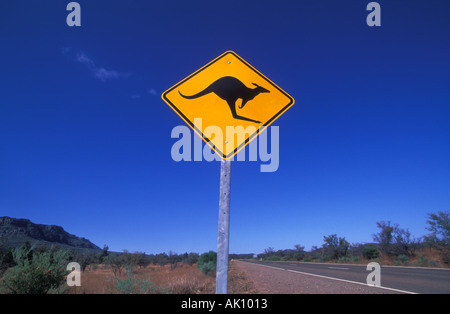 Kangaroo warning sign on an empty outback road in the Flinders range national park near Wilpena South Australia Stock Photo