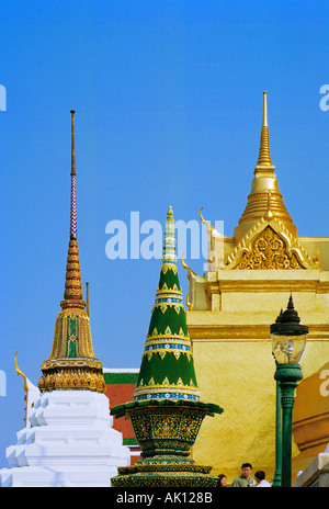 Royal Grand palace , Bangkok, Thailand -  Chedi roofs on the skyline at Wat Phra Kaeo Emerald Buddha at the Grand Palace Stock Photo