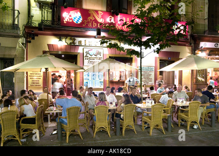 Sidewalk cafes and restaurants at night, Plaza Santa Ana, Madrid, Spain Stock Photo