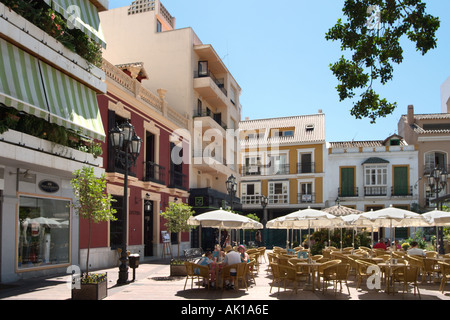 Street cafe in Plaza de la Constitucion, Fuengirola, Costa del Sol, Andalucia, Spain Stock Photo
