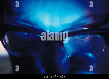 Close-up of man using microscope. Medical & pharmaceutical, Laboratory, Stock Photo