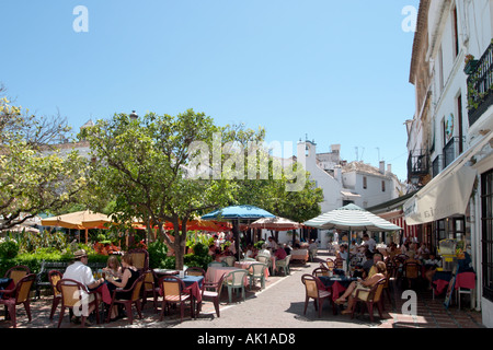 Pavement cafe in the Plaza de los Naranjos, Casco Antiguo (Old Town), Marbella, Costa del Sol, Andalusia, Spain Stock Photo