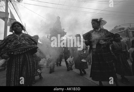 Festival San Martin Saints Day Saint Martin San Martin Chimaltenango Guatemala Mayan women walking with incense burners Stock Photo