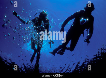 skin divers exploring underwater cave in Florida USA Stock Photo