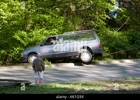car accident van drove into a ditch Stock Photo