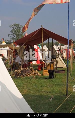 Campsite with cooking fire and many tents medieval reenactment Stock ...