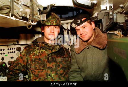 Soldiers of the German Bundeswehr manoeuvre with tanks in the training ...