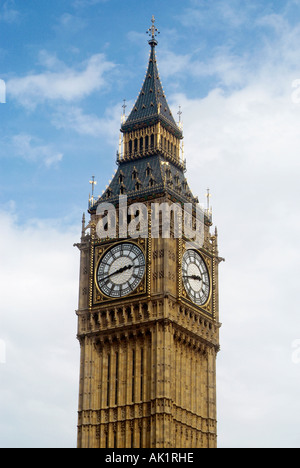 Big Ben clocktower with a blue sky with white clouds in a portrait format image. Stock Photo