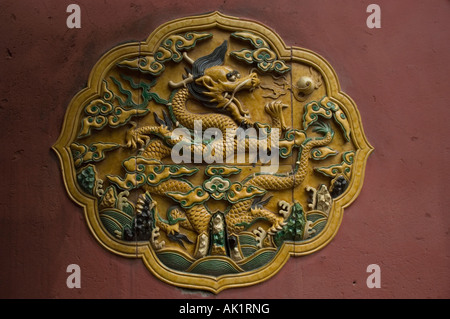 Dragon relief outside the Chonghua gong (palace of Double Glory) Forbidden City Beijing China Stock Photo