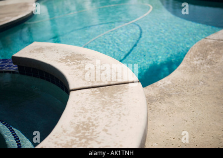 Detail of Stonework on Backyard Swimming Pool Stock Photo